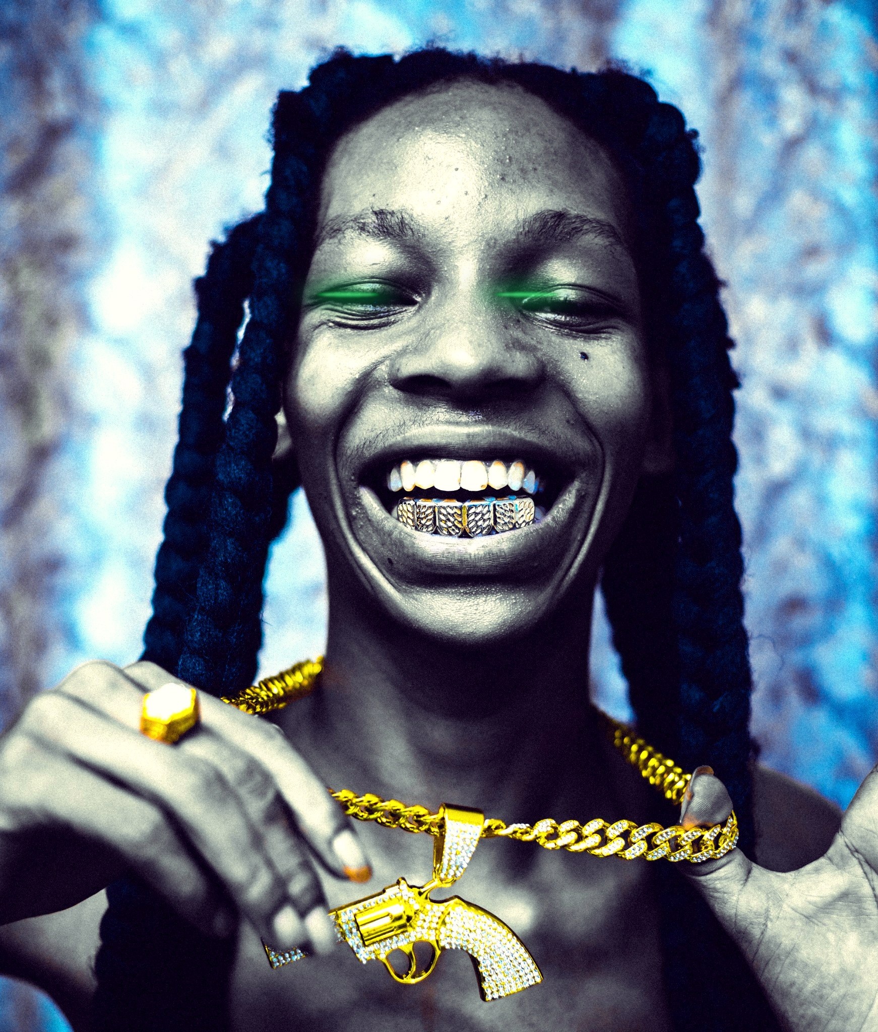 KING PLUS TZ smiling and showing his gold jewelry